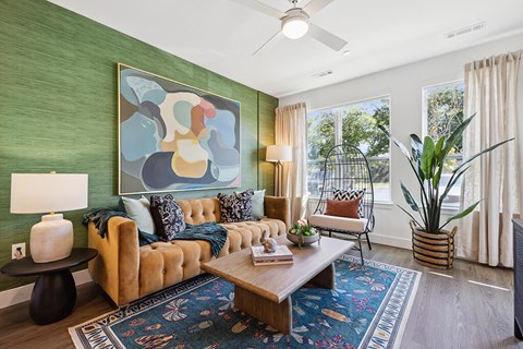 a living room with a couch and a table